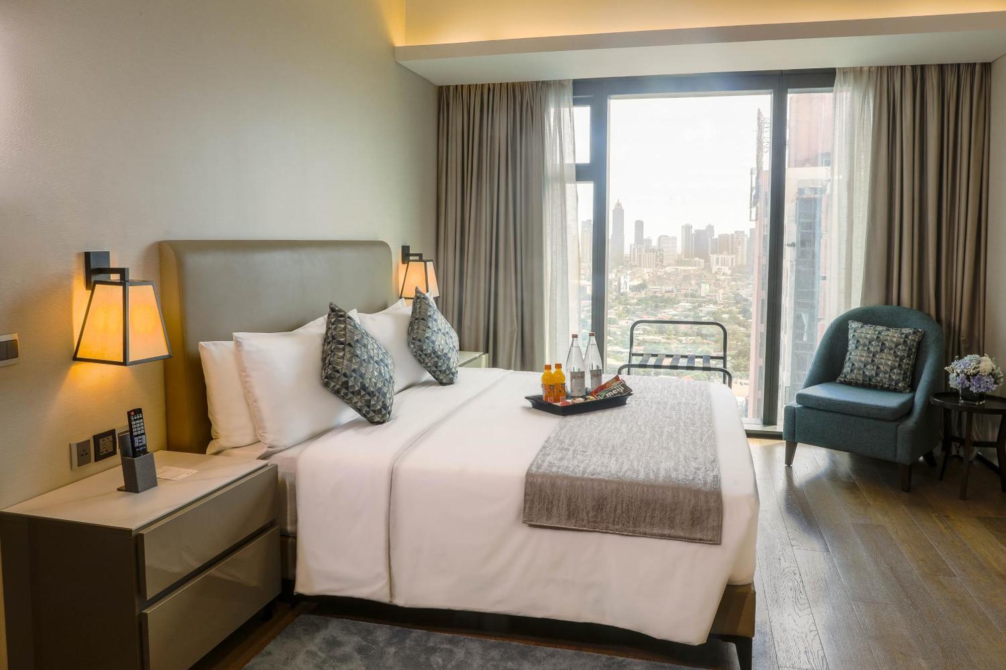 Отель Oakwood Makati Avenue Макати Экстерьер фото