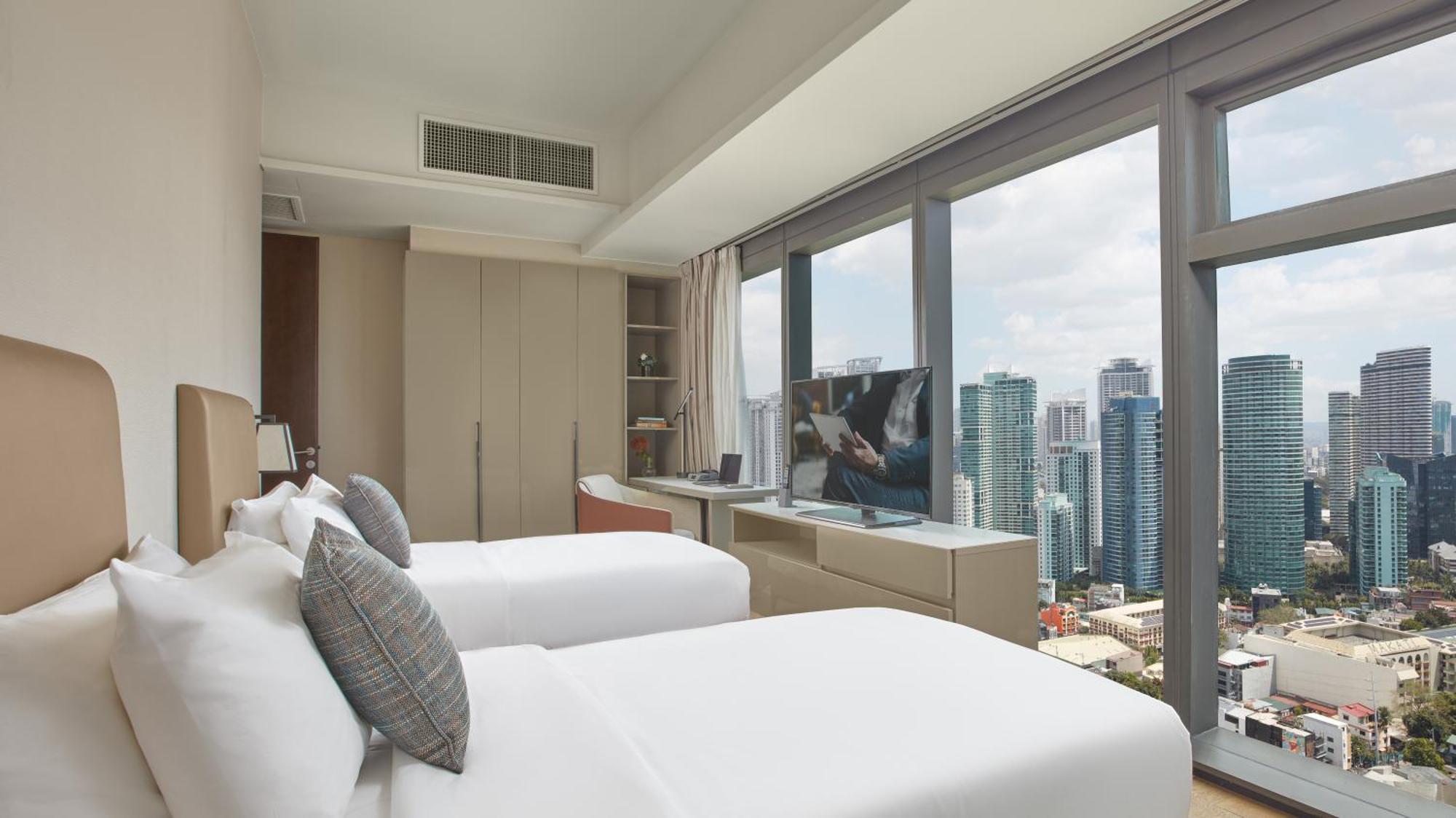 Отель Oakwood Makati Avenue Макати Экстерьер фото